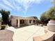 Expansive backyard with a large patio area and outdoor living space, perfect for entertaining or relaxation at 4286 E Buckboard Rd, Gilbert, AZ 85297