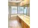 Spacious bathroom featuring dual sinks, tile flooring and lots of natural light at 4286 E Buckboard Rd, Gilbert, AZ 85297