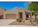 Charming single-story home with desert landscaping, a two-car garage, and a welcoming front entrance at 4286 E Buckboard Rd, Gilbert, AZ 85297