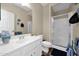 Bathroom featuring a vanity, toilet, and glass-enclosed shower, providing a functional and stylish space at 5018 E Siesta Dr # 3, Phoenix, AZ 85044