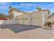 Spacious three-car garage and second story balcony with lush, mature landscaping at 5018 E Siesta Dr # 3, Phoenix, AZ 85044