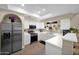Bright kitchen with stainless steel appliances and white cabinetry at 5018 E Siesta Dr # 3, Phoenix, AZ 85044