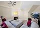 Bright living room with vaulted ceilings, fireplace, and comfortable seating at 5018 E Siesta Dr # 3, Phoenix, AZ 85044