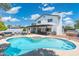 Gorgeous swimming pool and spa, with an outdoor kitchen, and multiple seating areas at 5101 E Winchcomb Dr, Scottsdale, AZ 85254