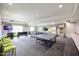 Entertaining game room featuring a ping pong table, foosball, and comfortable seating for fun-filled gatherings at 5450 E Deer Valley Dr # 2193, Phoenix, AZ 85054