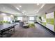 Spacious game room with table tennis, foosball, and lounge seating, perfect for recreation and socializing at 5450 E Deer Valley Dr # 2193, Phoenix, AZ 85054