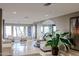 Inviting lobby area with tile floors, comfortable white seating, and ample natural light from large windows at 5450 E Deer Valley Dr # 2193, Phoenix, AZ 85054