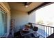 Relaxing covered patio with dining table and seating at 5450 E Deer Valley Dr # 2193, Phoenix, AZ 85054