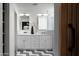 Modern bathroom featuring double vanity, updated mirrors, and decorative vase with branches at 6302 E Hillcrest Blvd, Scottsdale, AZ 85251