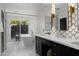 Stunning bathroom featuring double vanity, a soaking tub next to a glass enclosed shower, and luxury finishes at 6302 E Hillcrest Blvd, Scottsdale, AZ 85251