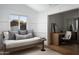 Bright bedroom with daybed, built-in desk, and wood floors at 6302 E Hillcrest Blvd, Scottsdale, AZ 85251