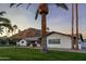This ranch-style home boasts mature landscaping and mountain views at 6302 E Hillcrest Blvd, Scottsdale, AZ 85251