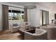 Bright living room featuring stylish seating, modern lighting, and sleek wood floors at 6302 E Hillcrest Blvd, Scottsdale, AZ 85251
