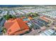 Panoramic aerial view showcasing the community center, pool, parking, and rows of well-maintained homes at 650 N Hawes Rd # 2872, Mesa, AZ 85207