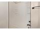 Bathroom featuring a white tub and shower combo with dark fixtures at 8134 E Obispo Ave, Mesa, AZ 85212