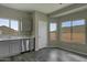 Efficient kitchen featuring grey cabinets, stainless appliances, and wood-look flooring at 8318 W Mcartney Rd, Casa Grande, AZ 85194