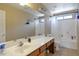 Bathroom showcasing a large vanity with single sink and mirror, with toilet and shower/tub combo in background at 8534 W Salter Dr, Peoria, AZ 85382