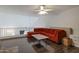 Open loft area featuring hardwood floors, a ceiling fan and railing that overlooks the lower level at 8534 W Salter Dr, Peoria, AZ 85382