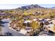 Desert community home featuring lush desert landscaping, mountain views, and close proximity to neighborhood at 9200 E Whitethorn Cir # 601, Scottsdale, AZ 85266