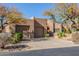 Charming home with a two-car garage and desert landscaping in a sunny neighborhood at 9200 E Whitethorn Cir # 601, Scottsdale, AZ 85266