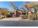 Charming home with a two-car garage and desert landscaping in a sunny neighborhood at 9200 E Whitethorn Cir # 601, Scottsdale, AZ 85266