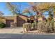 Charming home with a two-car garage and desert landscaping in a sunny neighborhood at 9200 E Whitethorn Cir # 601, Scottsdale, AZ 85266