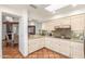 Bright kitchen featuring granite countertops, stainless steel appliances, and tiled flooring at 9200 E Whitethorn Cir # 601, Scottsdale, AZ 85266