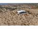 Aerial shot of a desert home with a vast landscape, perfect for private living and enjoying natural surroundings at 10020 W Tortalita Way, Casa Grande, AZ 85194