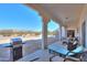 Spacious covered porch perfect for outdoor dining and entertaining with desert and mountain views at 10020 W Tortalita Way, Casa Grande, AZ 85194