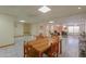Finished basement features neutral tile, recessed lighting, dining area, and cozy seating area for relaxing at 10020 W Tortalita Way, Casa Grande, AZ 85194