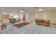Spacious finished basement with tile floors, ample lighting, and room for entertaining at 10020 W Tortalita Way, Casa Grande, AZ 85194