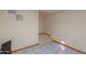 Finished basement showcasing tile flooring, a staircase, and neutral-toned walls and trim at 10020 W Tortalita Way, Casa Grande, AZ 85194
