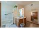Bright bathroom with a tile shower, vanity with good storage, and recessed lighting at 10020 W Tortalita Way, Casa Grande, AZ 85194