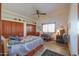 Inviting bedroom with natural light, built in closets, and a comfortable bed at 10020 W Tortalita Way, Casa Grande, AZ 85194