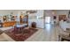 Formal dining room with decorative rug, chandelier, and large windows at 10020 W Tortalita Way, Casa Grande, AZ 85194