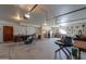 The spacious garage features high ceilings, ample lighting, and versatile space for storage or parking at 10020 W Tortalita Way, Casa Grande, AZ 85194