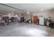 Spacious garage with high ceilings and ample storage, offering potential for workshop or multi-car parking at 10020 W Tortalita Way, Casa Grande, AZ 85194