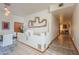 Open hallway leading to dining area and a decorative wall feature at 10020 W Tortalita Way, Casa Grande, AZ 85194