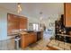 Kitchen featuring a center island with bar seating and stainless appliances at 10020 W Tortalita Way, Casa Grande, AZ 85194