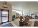 Bright living room features tile flooring, plenty of space, and lots of natural light at 10020 W Tortalita Way, Casa Grande, AZ 85194