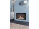Modern fireplace featuring a sleek design and a cozy ambiance, complemented by stylish decor at 10426 N 10Th St # 1, Phoenix, AZ 85020