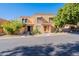 Charming two-story townhouse with a covered entry, desert landscaping, and ample parking at 10426 N 10Th St # 1, Phoenix, AZ 85020