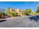 Exterior view of a two-story home featuring a covered entry and desert landscaping at 10426 N 10Th St # 1, Phoenix, AZ 85020