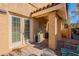 Covered porch featuring brick flooring, support columns, and a seating area at 10426 N 10Th St # 1, Phoenix, AZ 85020