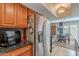 Bright kitchen with stainless steel refrigerator and appliances, connected to the dining area at 10426 N 10Th St # 1, Phoenix, AZ 85020