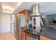 Modern kitchen featuring stainless steel appliances, granite countertops, and convenient washer/dryer access at 10426 N 10Th St # 1, Phoenix, AZ 85020