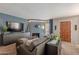 Cozy living room featuring a fireplace, TV, and comfortable seating, perfect for relaxation at 10426 N 10Th St # 1, Phoenix, AZ 85020