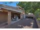 Covered patio with table and chairs, perfect for relaxing and entertaining outdoors at 10648 N 11Th St, Phoenix, AZ 85020