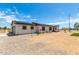 Well-maintained home featuring a two-car garage and spacious gravel yard at 1415 N 357Th Ave, Tonopah, AZ 85354