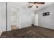 Spacious bedroom with ensuite bath offering privacy and comfort, ideal for relaxation at 15357 W Post Cir, Surprise, AZ 85374